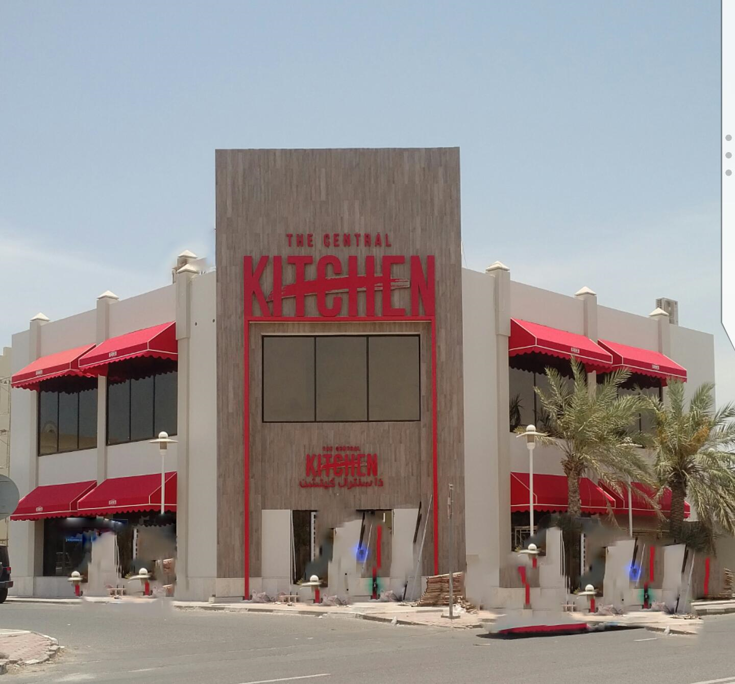 Photocatalytic coating applied to a commercial building exterior